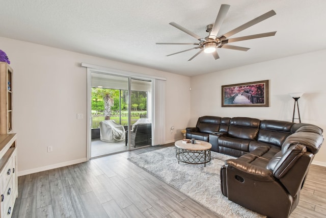 182 Myrtle Oak Ct, Saint Augustine, FL 32092 - living room with ceiling fan, wood finished floors, baseboards, and a textured ceiling