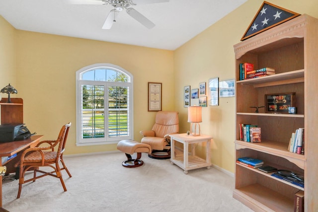 office area featuring ceiling fan, carpet floors, and baseboards