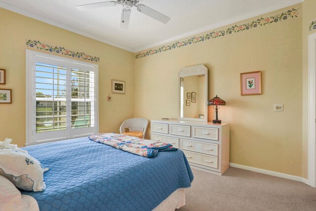 bedroom featuring light carpet, crown molding, baseboards, and ceiling fan