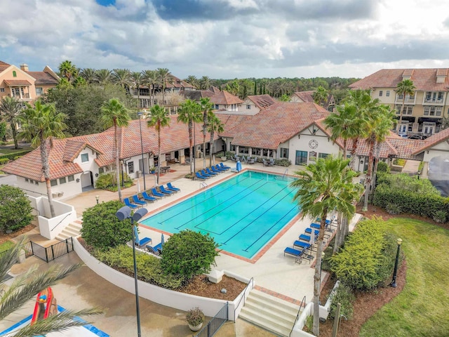 view of swimming pool with a patio