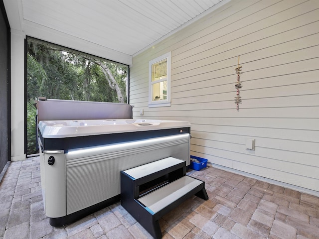 view of patio featuring a hot tub