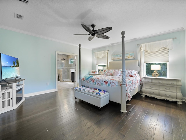 bedroom with ensuite bathroom, crown molding, ceiling fan, dark hardwood / wood-style floors, and a textured ceiling