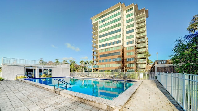 view of swimming pool featuring a patio