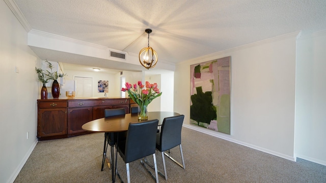 dining room with a textured ceiling, light colored carpet, crown molding, and an inviting chandelier