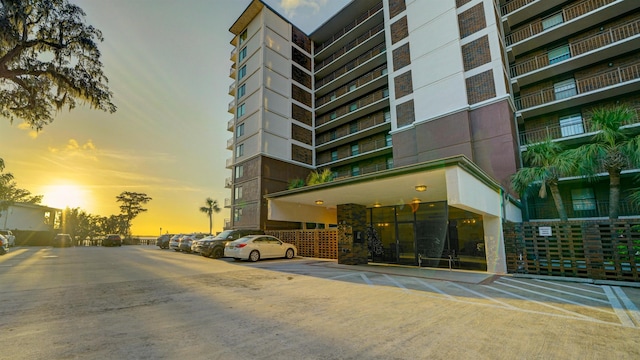 view of outdoor building at dusk