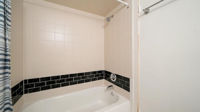 bathroom with shower / tub combo