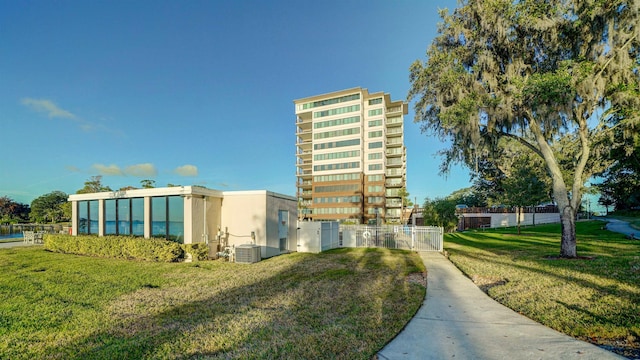 view of building exterior featuring central air condition unit