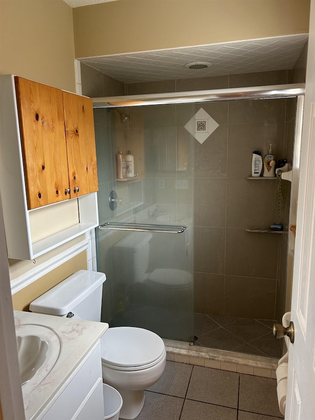 1417 Golf Ave, Ormond Beach, FL 32174 - bathroom featuring tile patterned floors, a shower stall, and vanity