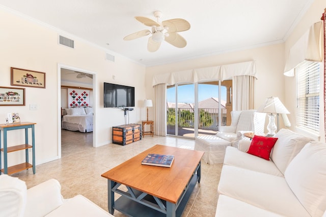 tiled living room with ceiling fan and ornamental molding