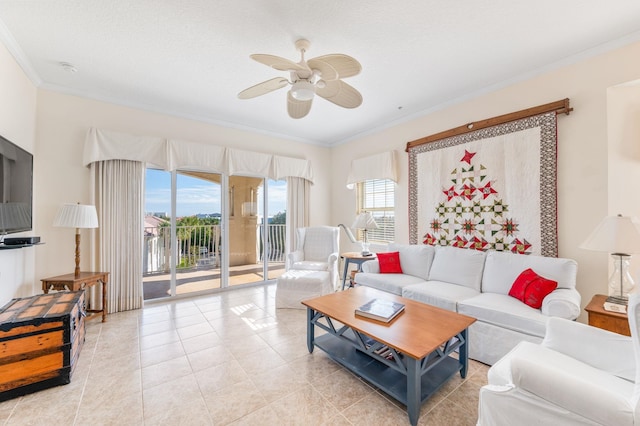 living room featuring light tile patterned floors, a textured ceiling, ceiling fan, and crown molding