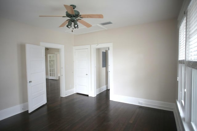 78 Riberia St, Saint Augustine, FL 32084 - empty room featuring ceiling fan, baseboards, dark wood finished floors, and attic access