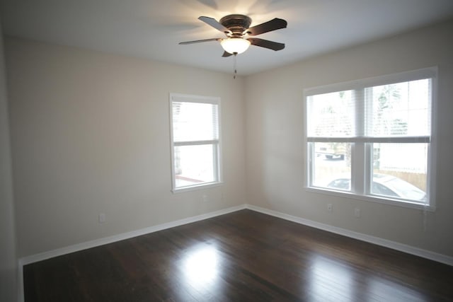 78 Riberia St, Saint Augustine, FL 32084 - spare room with dark wood finished floors, baseboards, and ceiling fan