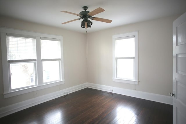 78 Riberia St, Saint Augustine, FL 32084 - empty room with healthy amount of natural light, baseboards, and dark wood-style flooring