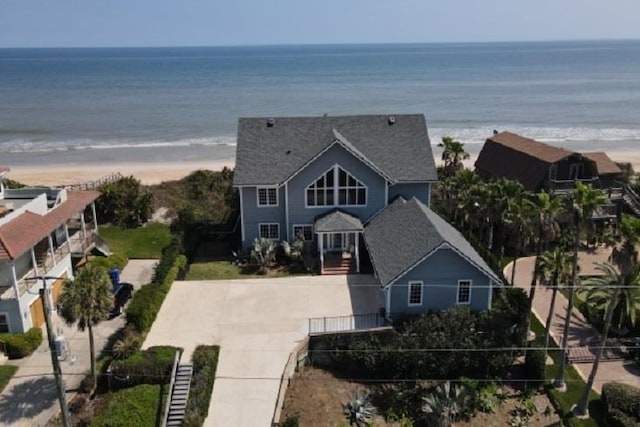 aerial view featuring a view of the beach and a water view