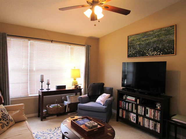 28212 Harbour Vista Cir, Saint Augustine, FL 32080 - living area with vaulted ceiling, carpet floors, a ceiling fan, and baseboards