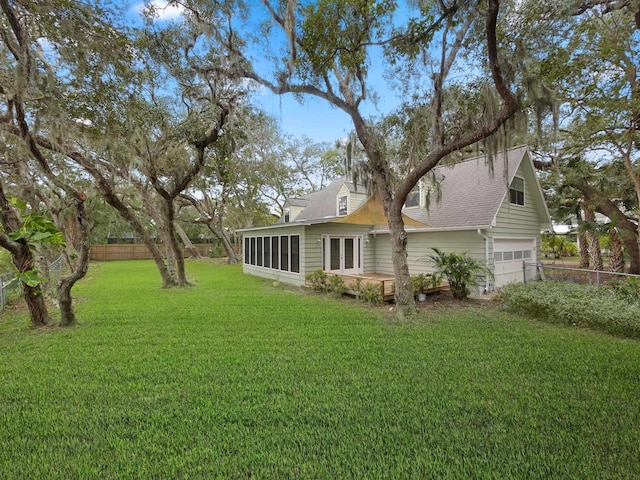 view of yard featuring a garage