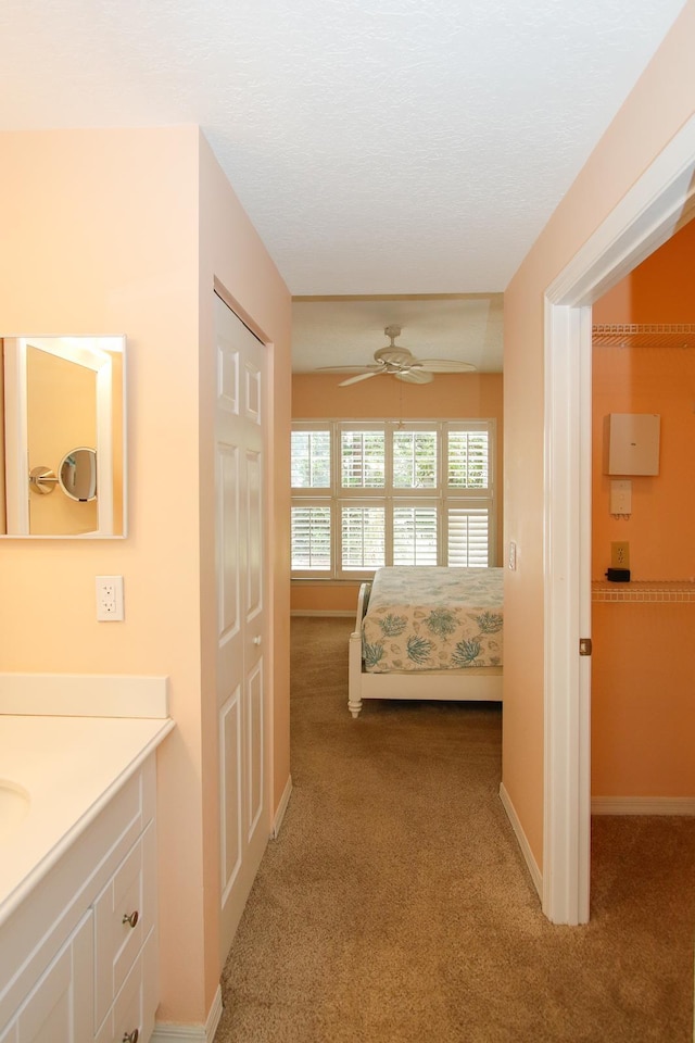 35103 Harbour Vista Cir, Saint Augustine, FL 32080 - carpeted bedroom featuring baseboards, ceiling fan, and a closet