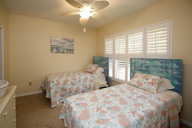 35103 Harbour Vista Cir, Saint Augustine, FL 32080 - bedroom featuring baseboards, a ceiling fan, and carpet