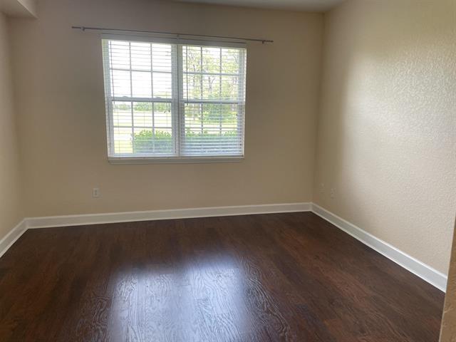 623 Shores Blvd, Saint Augustine Shores, FL 32086 - unfurnished room featuring dark hardwood / wood-style floors