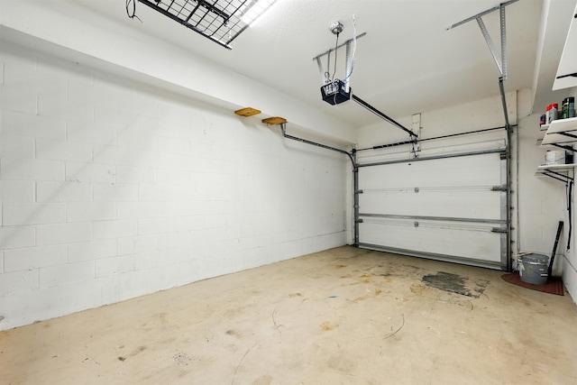 623 Shores Blvd, Saint Augustine Shores, FL 32086 - garage with a garage door opener and concrete block wall