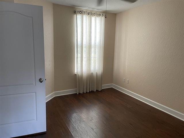 623 Shores Blvd, Saint Augustine Shores, FL 32086 - unfurnished room featuring ceiling fan and dark wood-type flooring