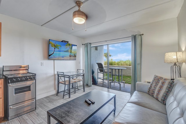 living room with ceiling fan