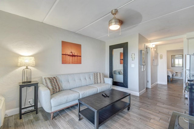 living room with ceiling fan