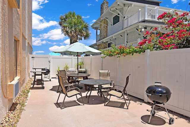 view of patio / terrace with a balcony