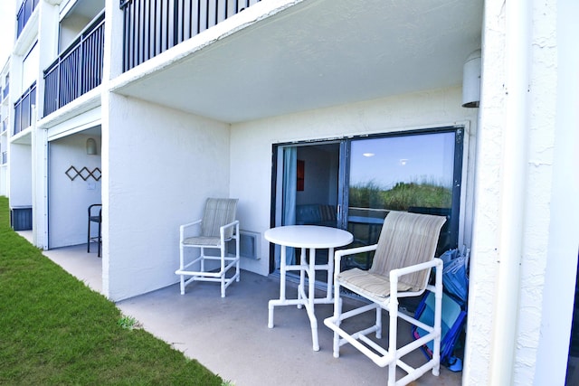 view of patio / terrace with a balcony