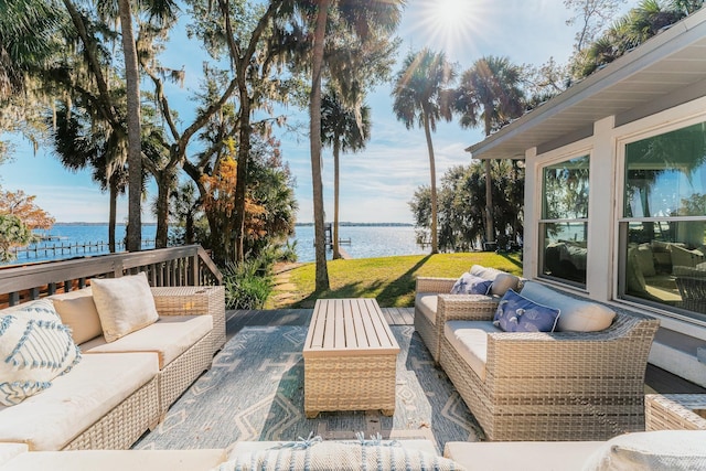 view of patio / terrace featuring an outdoor living space and a water view