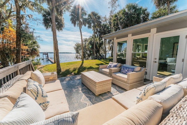 277 W River Rd, Palatka, FL 32177 - view of patio with an outdoor living space and a water view