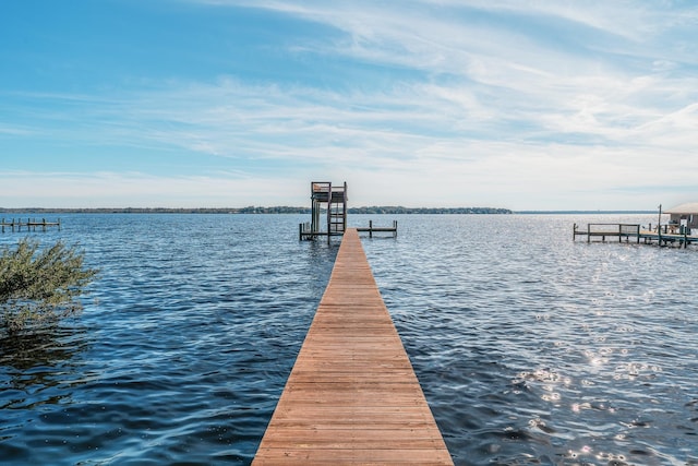 view of dock with a water view