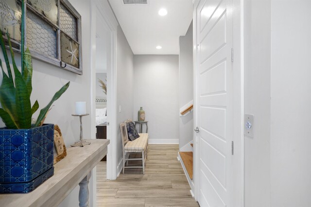 5450 A1A, Saint Augustine, FL 32080 - hallway with light wood-style flooring and recessed lighting