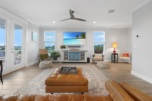 5450 A1A, Saint Augustine, FL 32080 - living area featuring wood finished floors, ornamental molding, healthy amount of natural light, recessed lighting, and a ceiling fan