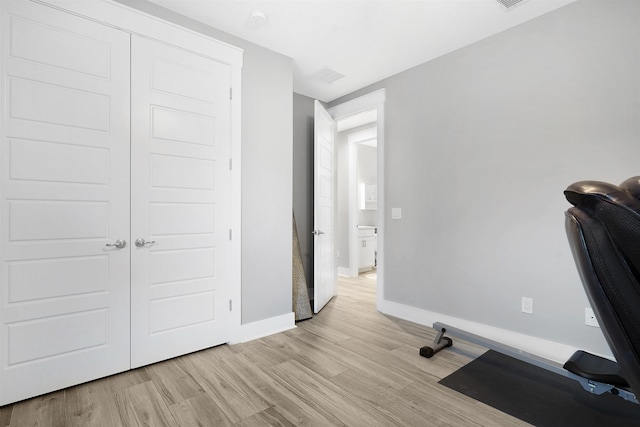 5450 A1A, Saint Augustine, FL 32080 - workout area featuring light wood-style flooring and baseboards