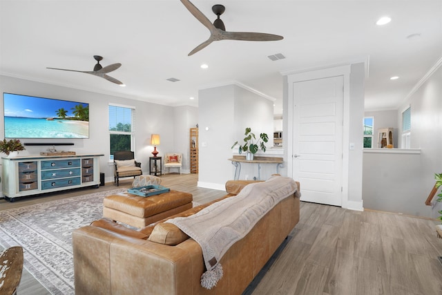 5450 A1A, Saint Augustine, FL 32080 - living room featuring ceiling fan, ornamental molding, recessed lighting, and wood finished floors