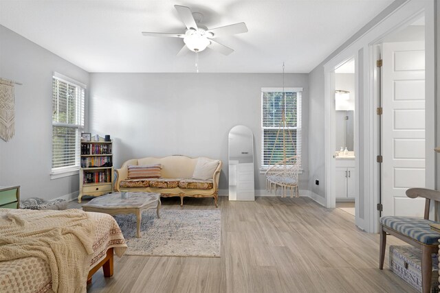 5450 A1A, Saint Augustine, FL 32080 - bedroom featuring light wood-style flooring, multiple windows, and a ceiling fan
