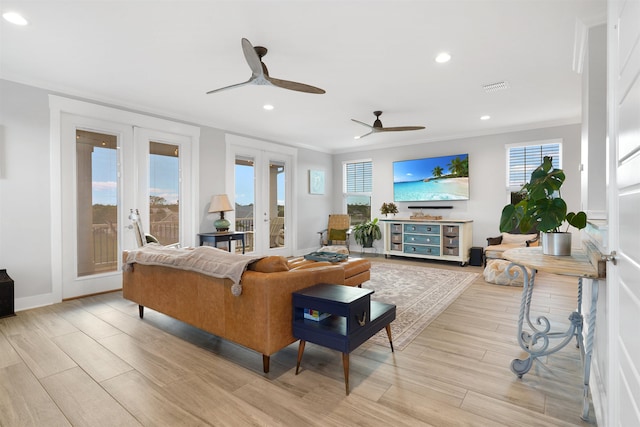 5450 A1A, Saint Augustine, FL 32080 - living area featuring french doors, ceiling fan, ornamental molding, light wood finished floors, and recessed lighting