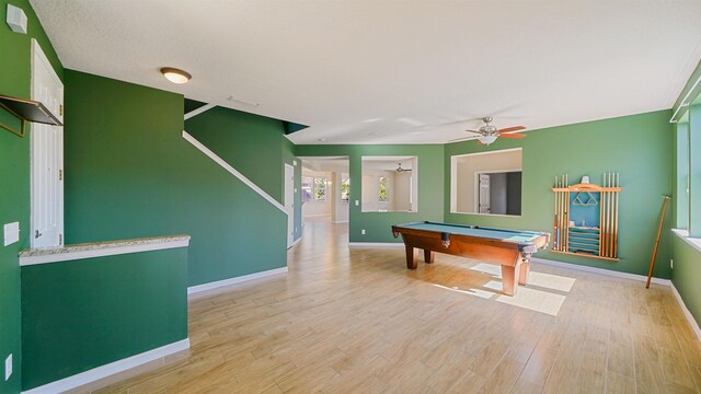 recreation room with ceiling fan, light hardwood / wood-style flooring, and billiards