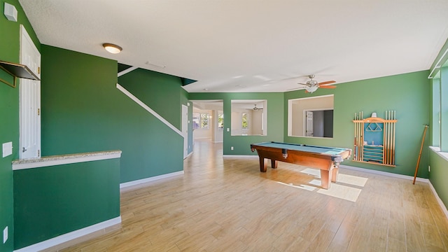 playroom featuring billiards, ceiling fan, and light wood-type flooring