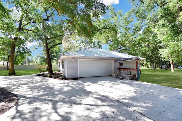 885 Wildwood Dr, Saint Augustine, FL 32086 - garage featuring concrete driveway