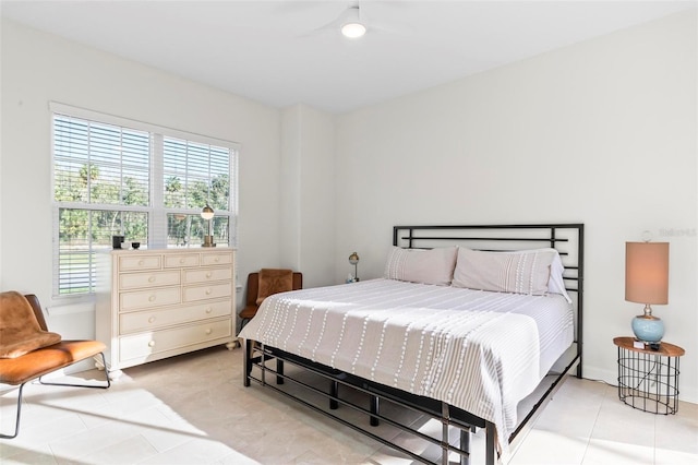 bedroom with light tile patterned floors