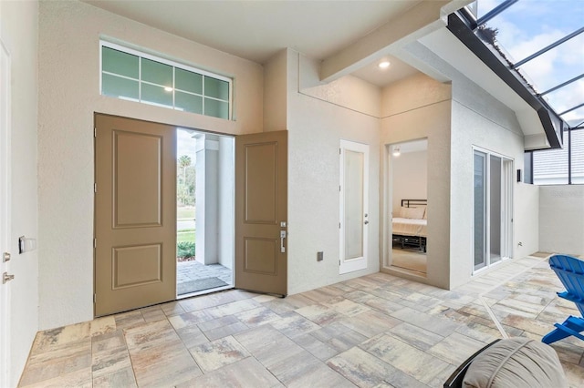 foyer with beam ceiling