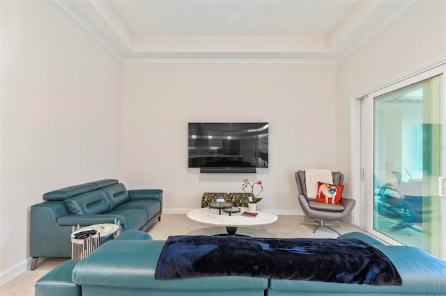 living area featuring carpet flooring, baseboards, and ornamental molding