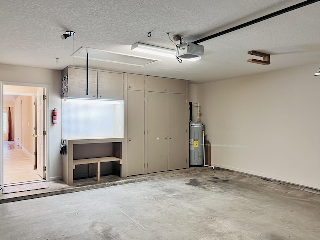 735 E Red House Branch Rd, Saint Augustine, FL 32084 - garage with a garage door opener, electric water heater, and baseboards