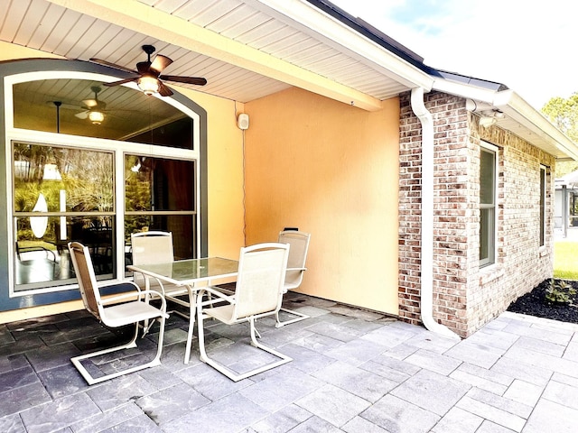 735 E Red House Branch Rd, Saint Augustine, FL 32084 - view of patio featuring ceiling fan and outdoor dining space