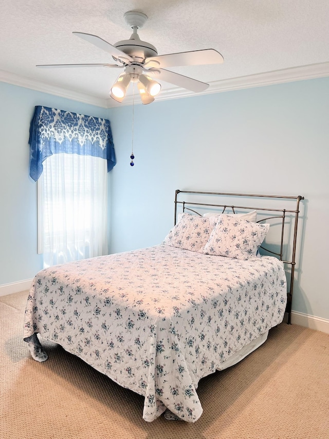 735 E Red House Branch Rd, Saint Augustine, FL 32084 - carpeted bedroom featuring ornamental molding, baseboards, and a ceiling fan