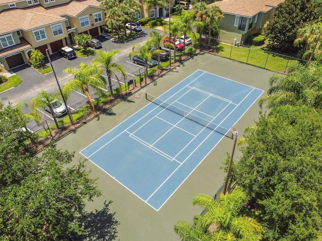 view of tennis court with basketball court