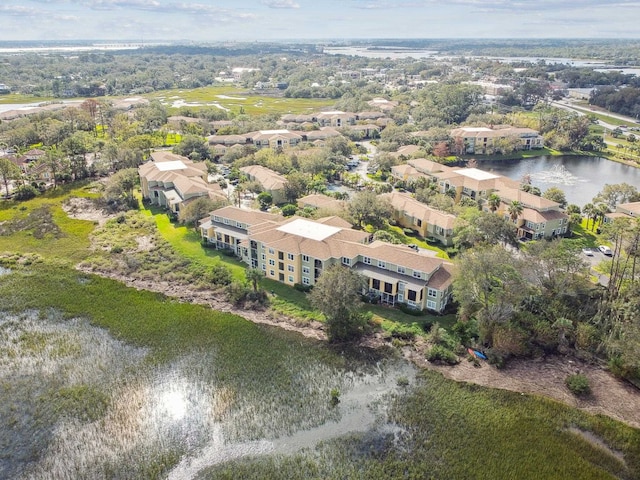 drone / aerial view featuring a water view