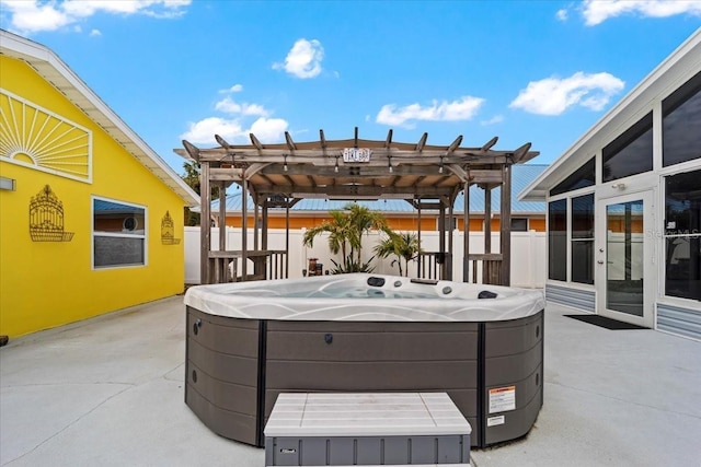 342 Euclid Ave, Daytona Beach, FL 32118 - view of patio / terrace featuring a hot tub, a pergola, and french doors